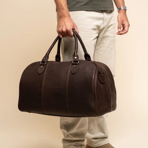 The Chesterfield Brand Kožená cestovní taška - weekender C20.007001 Liam II hnědá v ruce