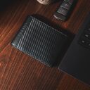 Bugatti Pánská kožená peněženka RFID Comet 49220401 černá na stole